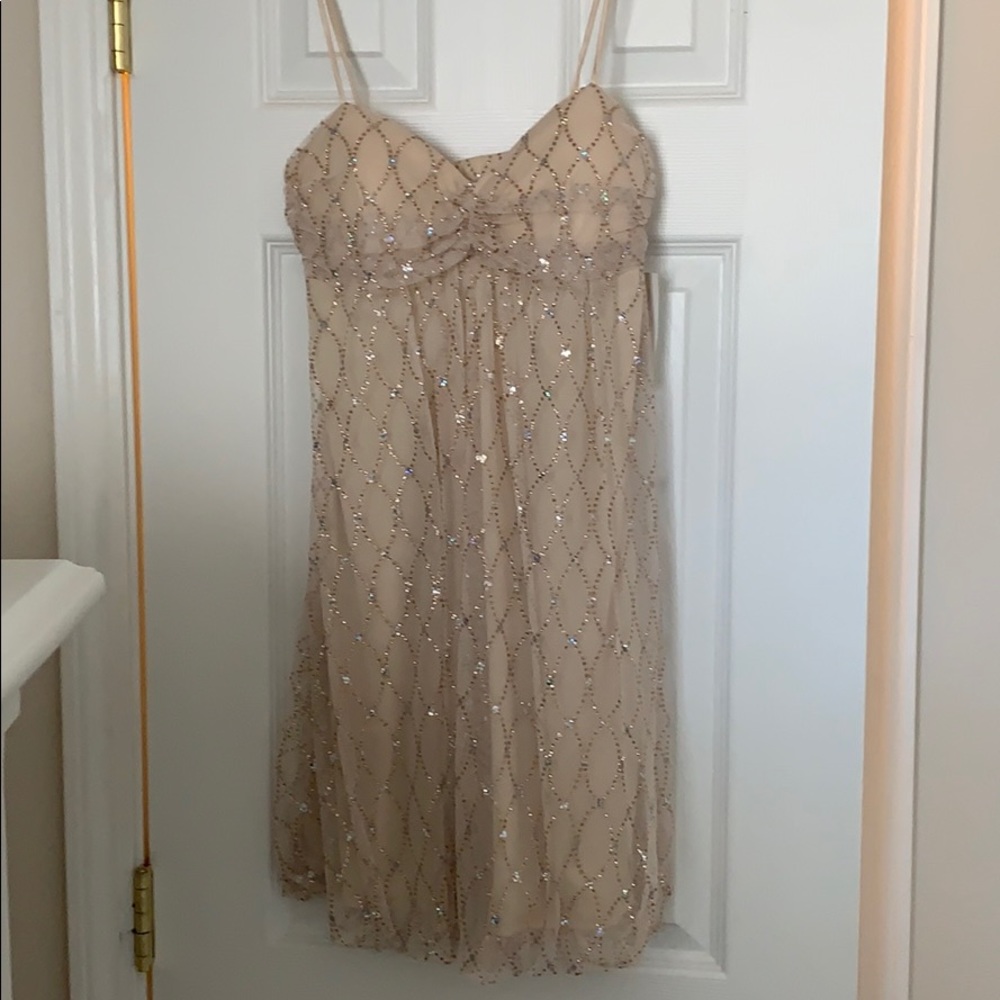 Babydoll, sequined dress.